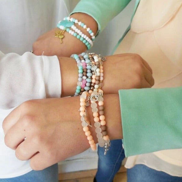 girls with bracelets